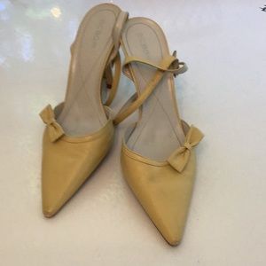 BCBGGirls leather marigold yellow pumps with bows